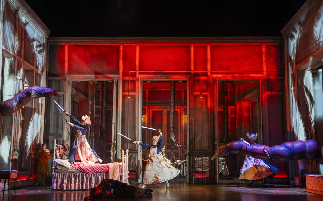 Katie Sharpe as Second Lady, Egor Zhuravskii as Tamino, Charlie Drummond as First Lady, and Hazel Croft as Third Lady in Opera North's production of Mozart's 'The Magic Flute'. Photo © 2024 Tristram Kenton