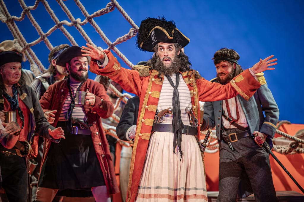 John Savournin as The Pirate King with members of the English National Opera Chorus in ENO's revival of Gilbert and Sullivan's 'The Pirates of Penzance' at the London Coliseum. Photo © 2024 Craig Fuller