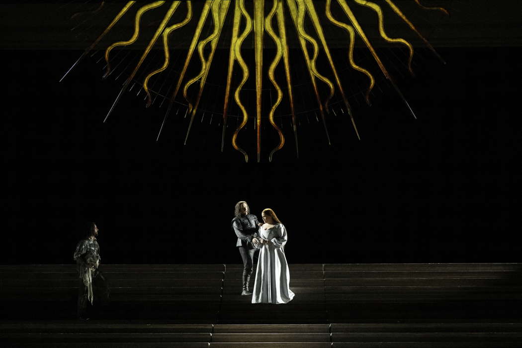 Ryan Vaughan Davies as Ruiz, Michael Fabiano as Manrico and Rachel Willis-Sørensen as Leonora in Adele Thomas' production of Verdi's 'Il Trovatore' for The Royal Opera. Photo © 2025 Camilla Greenwell