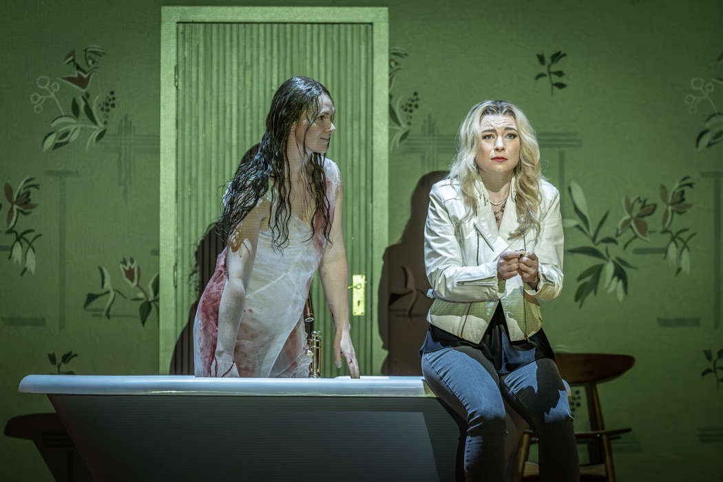 Marta Fontanals-Simmons as Linda with Welsh-Ukranian soprano Natalya Romaniw as Helena in 'Festen' at Covent Garden. Photo © 2025 Marc Brenner
