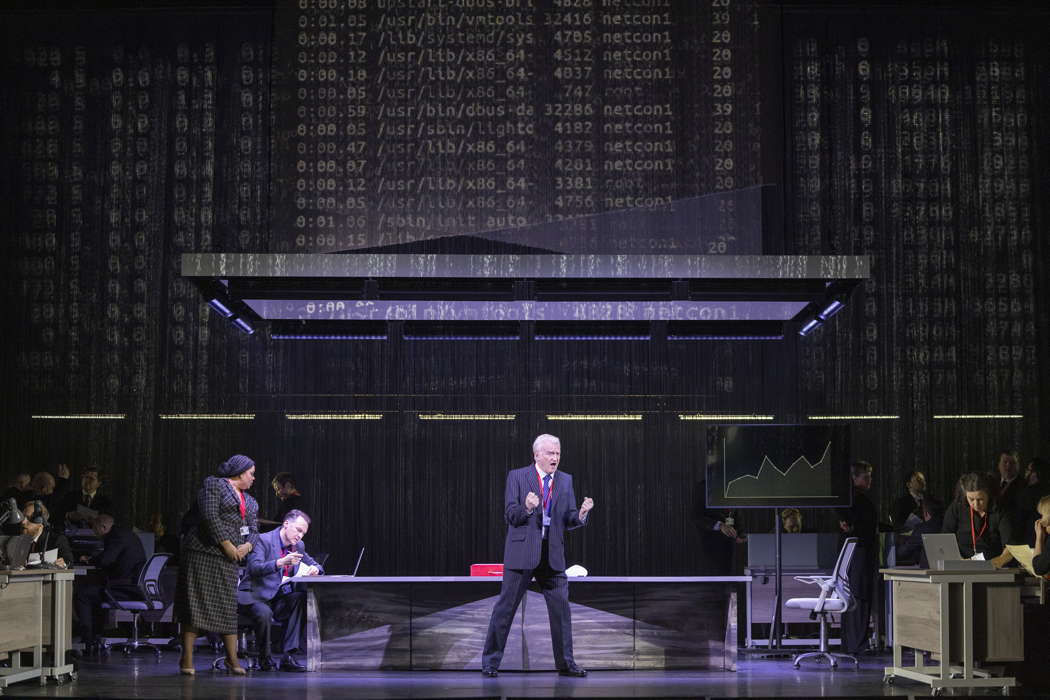 Molly Barker as Mary, Edgaras Montvidas as Erik/Steersman and Clive Bayley as Daland with members of the Chorus of Opera North in Opera North's production of Wagner's 'The Flying Dutchman'. Photo © 2025 James Glossop