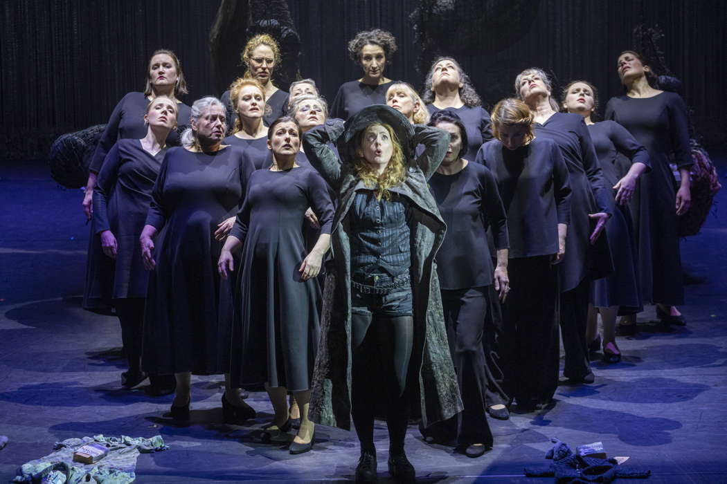 Layla Claire as Senta with the ladies of the Chorus of Opera North in Opera North's production of Wagner's 'The Flying Dutchman'. Photo © 2025 James Glossop