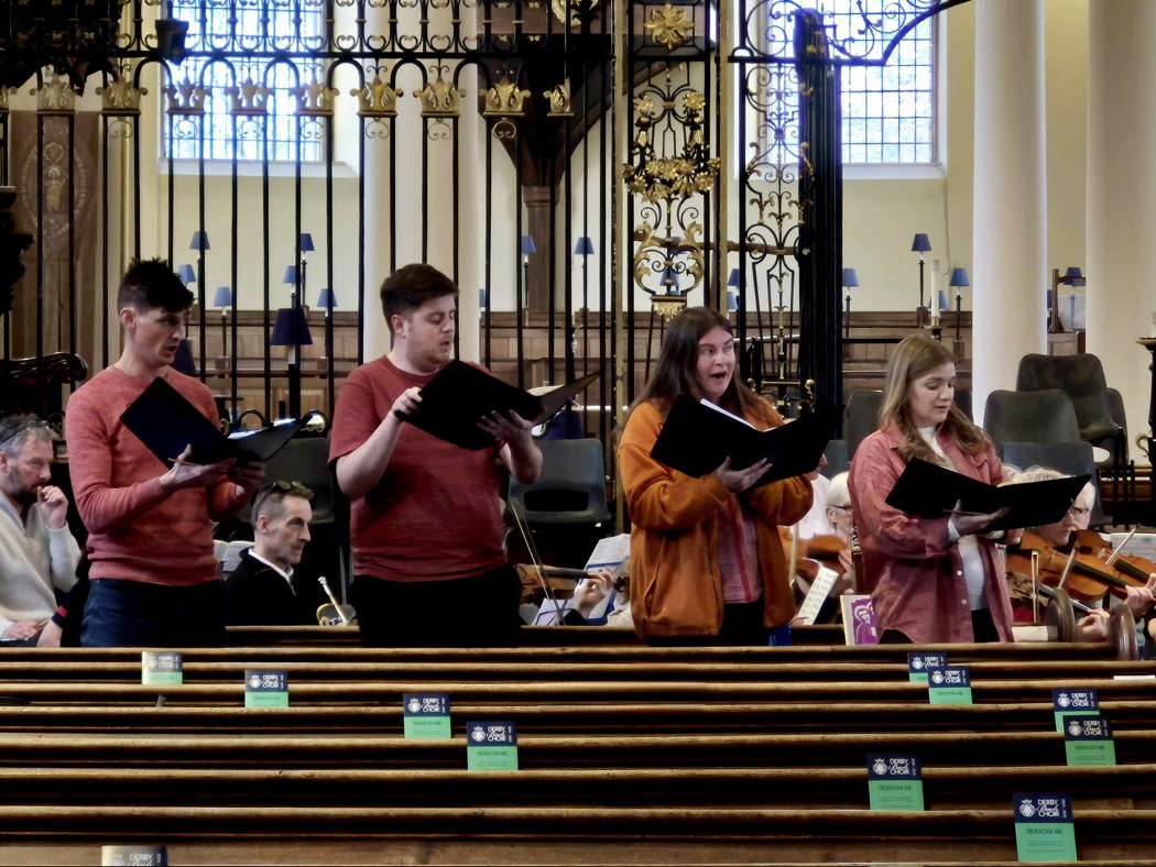 Soloists Matt Jordan, Liam McNally, Natalie Windsor and Charlotte O'Hare with members of Derby Bach Orchestra rehearsing Haydn's 'Missa in Tempore Belli' for the 29 March 2025 concert